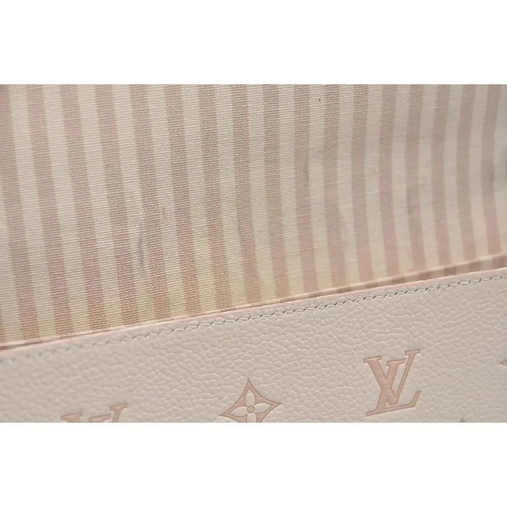Louis Vuitton House's signature Monogram Pochette Felicie